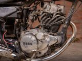 a close up view of a motorcycle with a small engine