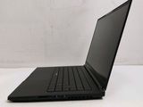 a black laptop sitting on a white surface
