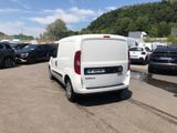 a white van that is parked in a parking lot