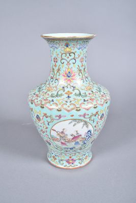 a blue vase with a picture of a bird on it