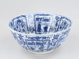 a blue and white bowl with a pattern on the inside of it
