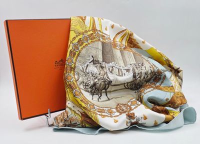 a scarf with a picture of a horse and carriage on it