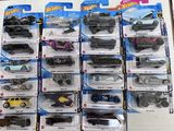 a lot of hot wheels on display in the box