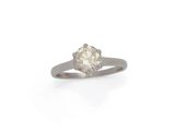 a diamond single - stone ring set in 18k white gold