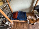 a room with a lot of boxes and crates on the floor