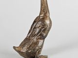 an image of a bronze statue of a duck on a white background