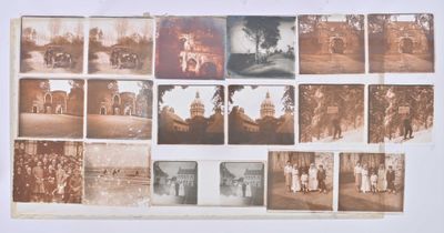 an old photo of a bunch of old photos on a wall