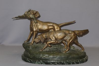 statue of two dogs on a marble base with a bird in the mouth