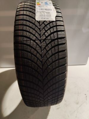 a close up of a tire on a white surface