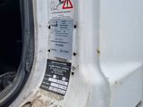 a close up of a car door with a sticker on it
