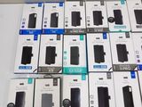 many boxes of cell phones sitting on a table
