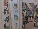 many old french children ' s books on a table