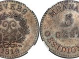 a close up of a coin with a wreath on it