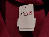 an image of a close up of a red coat with a tag on it