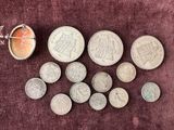 a lot of coins that are on the table