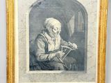 une vieille photo d'une femme assise devant une fenêtre