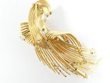an image of a gold and diamond broochle