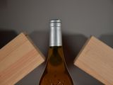 a bottle of wine that is sitting on a table