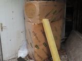 a pile of boxes sitting on the floor of a building