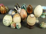 many different types of eggs and bowls on the table