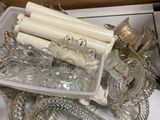 a box with a lot of glass items in it