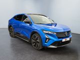 a blue suv parked in a room with a black floor