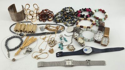 many different types of jewelry on the table