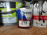 a can of paint and a can of paint on a table