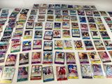 many different types of pokemon cards on the table