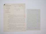 an old letter and a piece of paper on a table