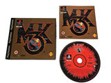 the cd is sitting on the table next to the cd case