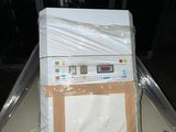 a box on the back of a boat that is wrapped in plastic