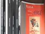 plusieurs livres sur une étagère dans une boîte à livres