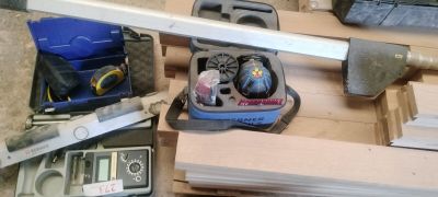 many tools that are laying out on the floor