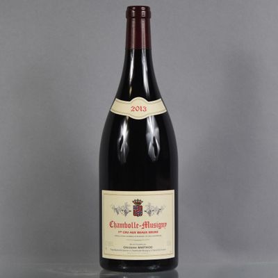a bottle of wine that is sitting on a table