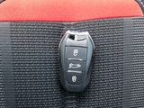 a car key in the back seat of a car