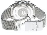 the watch is silver and has a metal band with a logo on it