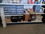 a lot of boxes on the shelves in the room