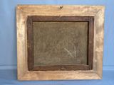 an old picture frame with a picture of a cross on it