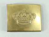 an image of a gold plate with a crown on it