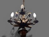 a chandelier hanging from the ceiling with three lights