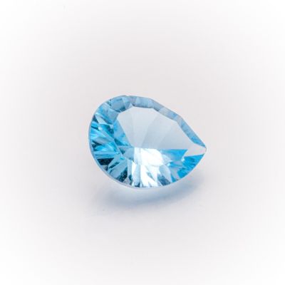 a blue topazte gems on a white background