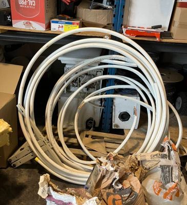 a pile of wires and other items on the floor