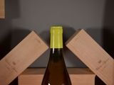 a bottle of wine that is sitting on a table