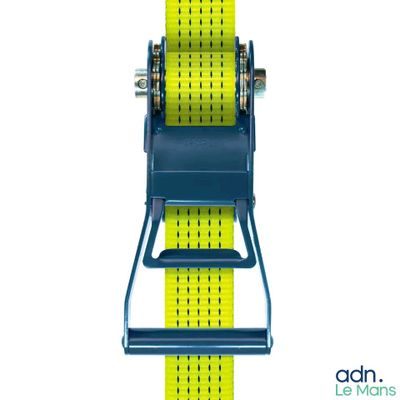 the yellow strap is attached to the blue strap on the watch