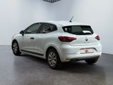 the rear end of a white car in a white room
