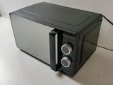 a microwave that is sitting on a table