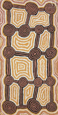 une photo d'un tapis marron et blanc orné de cercles