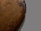 a close up of a wooden object on a table