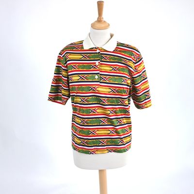 striped polo shirt on a mannequin base with a white collar